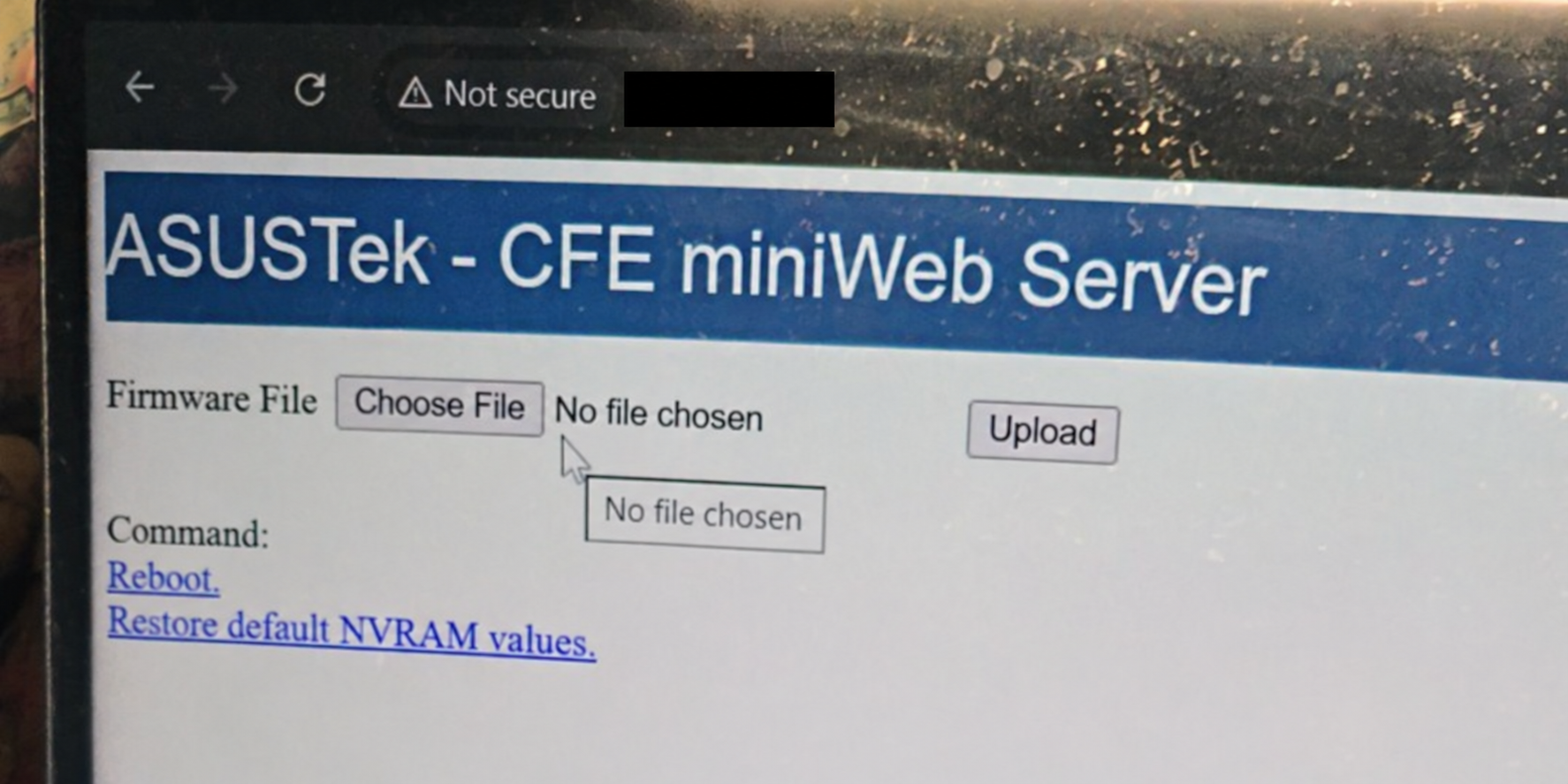 The ASUS CFE recovery page used to upload OpenWrt, with the router address covered.